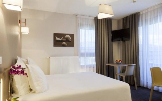 INVESTISSEMENT LOCATIF – ANNEMASSE – Résidence de Tourisme Nehô Suites – Porte de Genève – 6,98 % de rentabilité