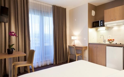 INVESTISSEMENT LOCATIF – ANNEMASSE – Résidence de Tourisme Nehô Suites – Porte de Genève – 6,98 % de rentabilité