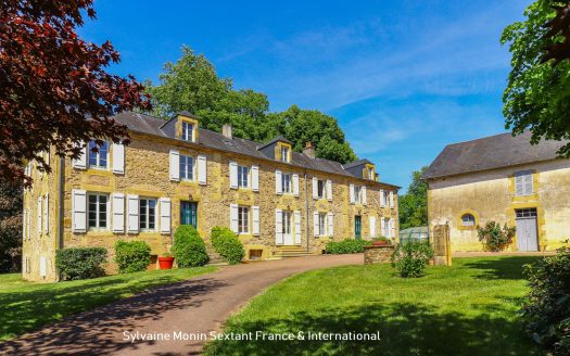 Superbly refurbished estate set on about 6.43 acres, featuring outbuildings and a pool area with a dovecote