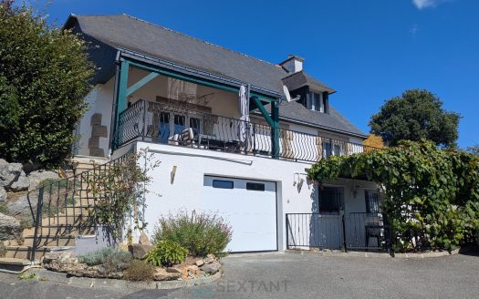 Exclusive listing – Beautiful family property with heated swimming pool and open views