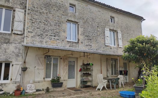 Stone house near Ruffec with outbuildings