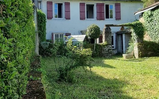 Large house in the centre of town with a large plot of land