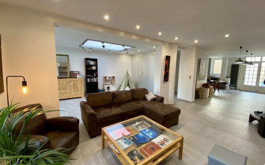 Family house with garden, garage and outbuildings