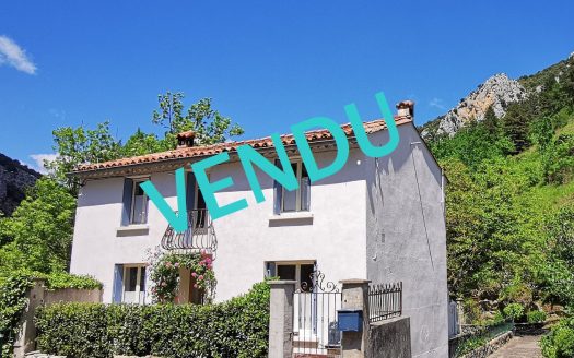 Detached two-bedroom stone house with courtyard and terraces